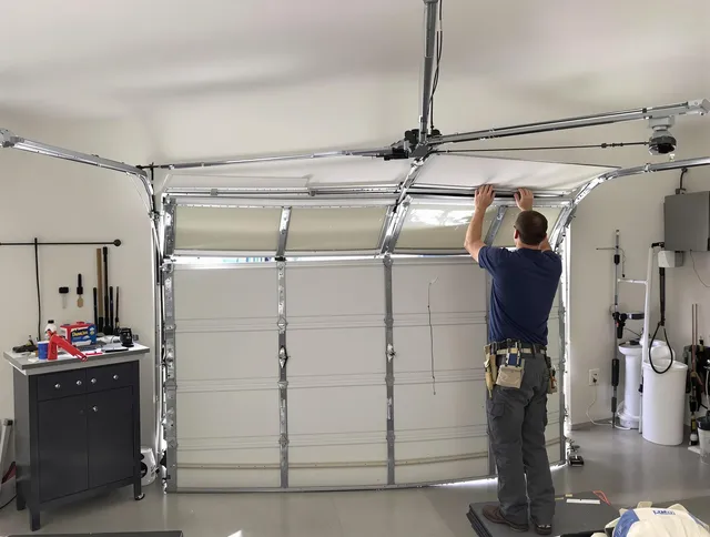 West Covina Garage Door Repair specialist performing precise section replacement on West Covina garage door